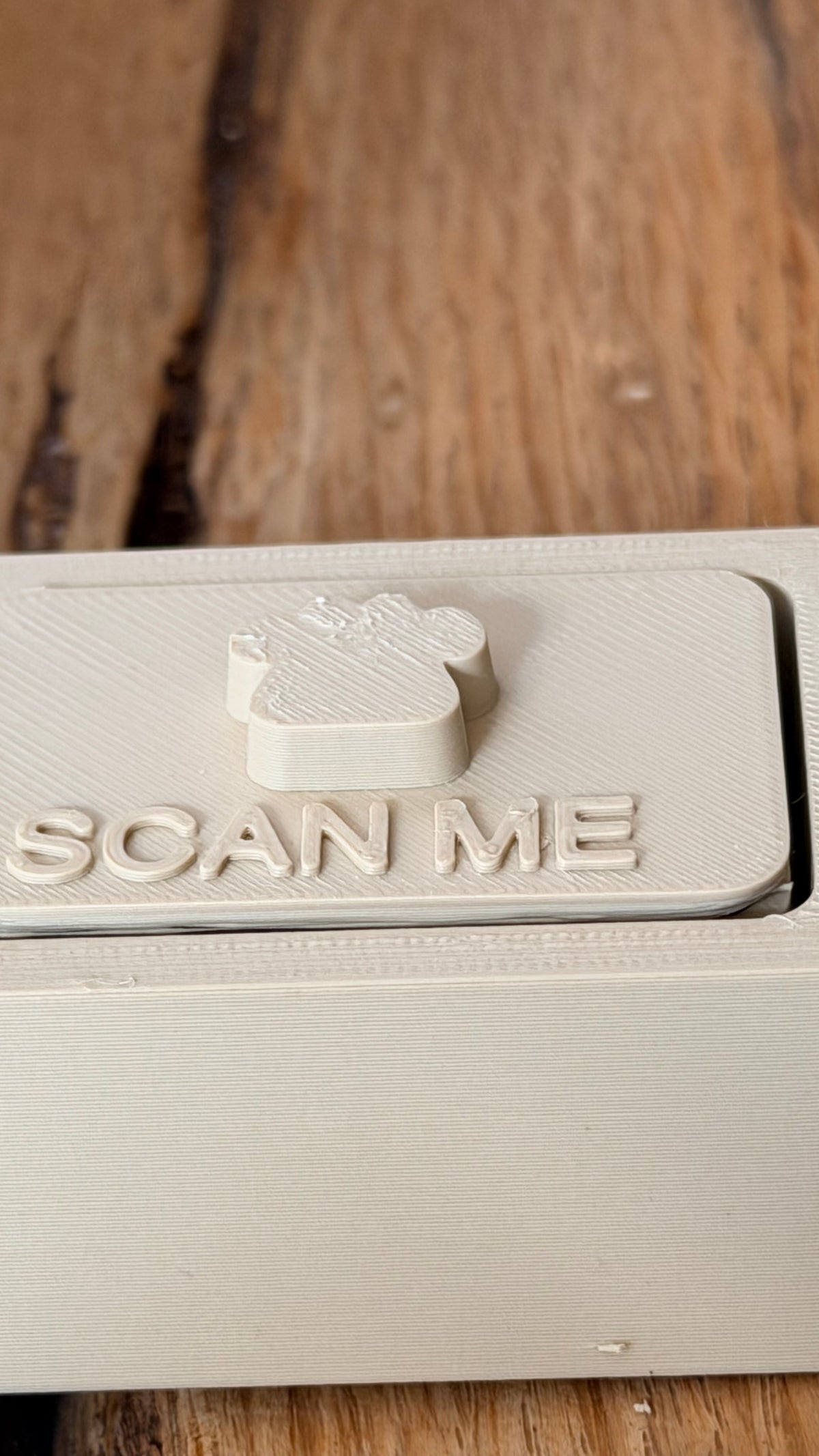 Echte detailfoto · deksel SCAN ME
